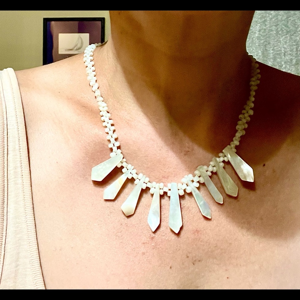 Vintage hand strung mother of pearl necklace. I bought this in France.